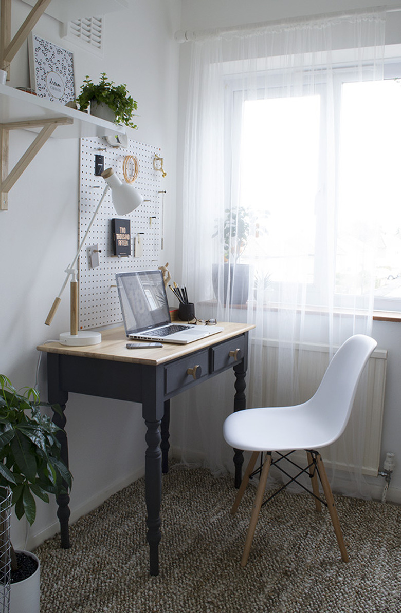 minimalist modern home office design with peg board