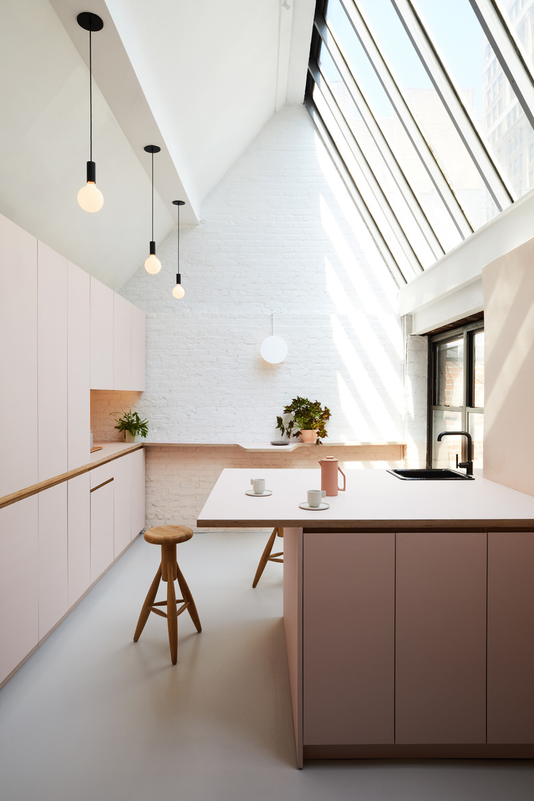 pink minimalist room paint colors in kitchen with skylight