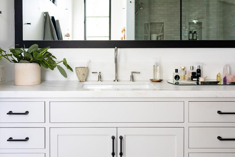 light grey bathroom vanity, sink and mirror