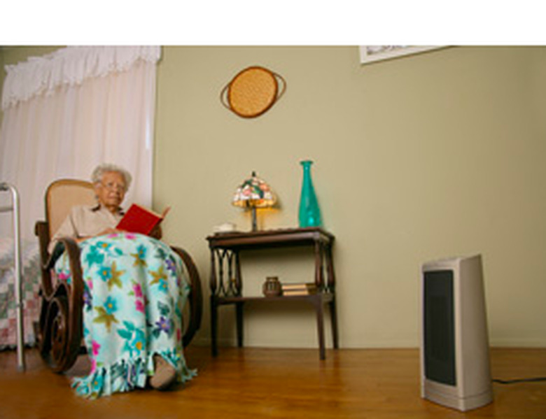 Reading by the space heater.