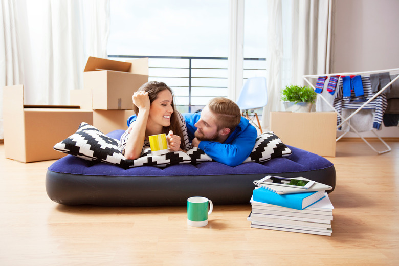 Young couple in their new apartment