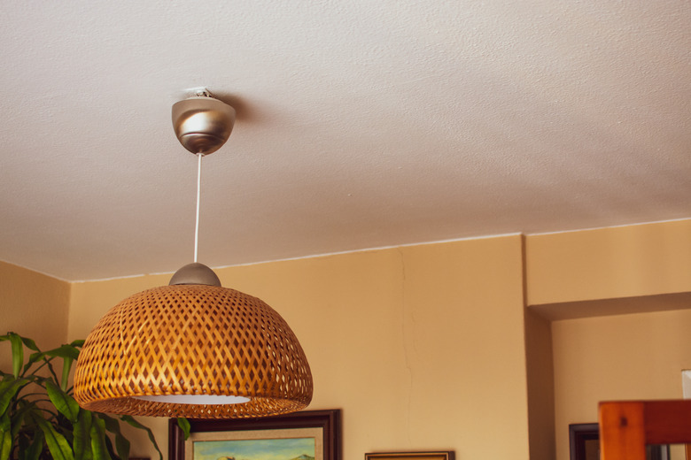 detail of rustic ceiling lamp in the living room, decoration