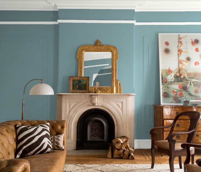 Benjamin Moore's color of the year Aegean Teal in living room with fireplace