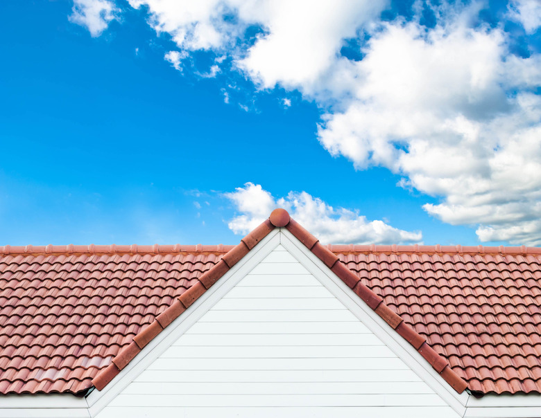 red rooftop against blue sky