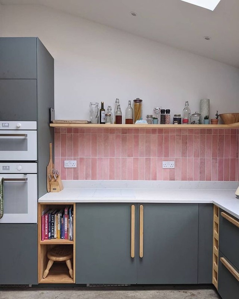 ikea cabinets with pink backsplash and custom handles