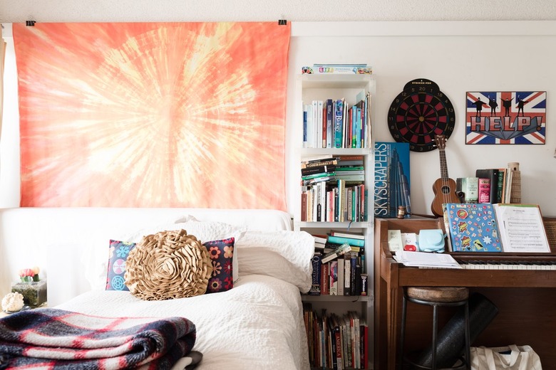 orange tie-dye tapestry in teen girl