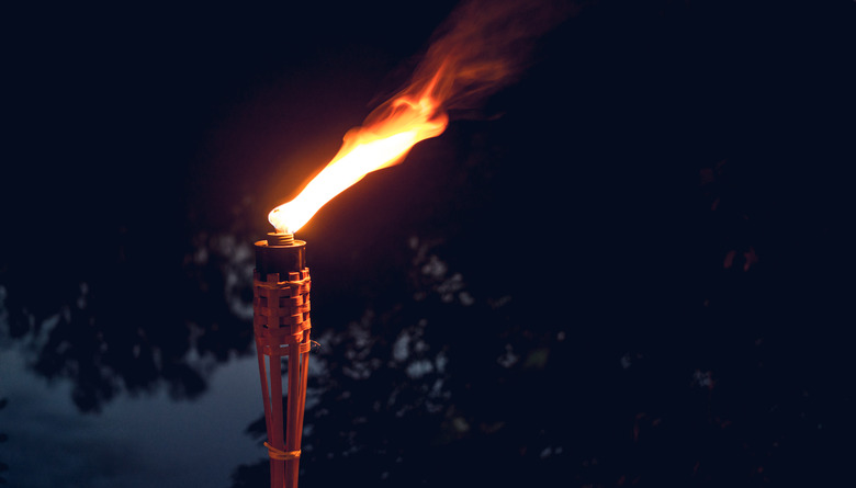 Holiday outdoor. Burning torch