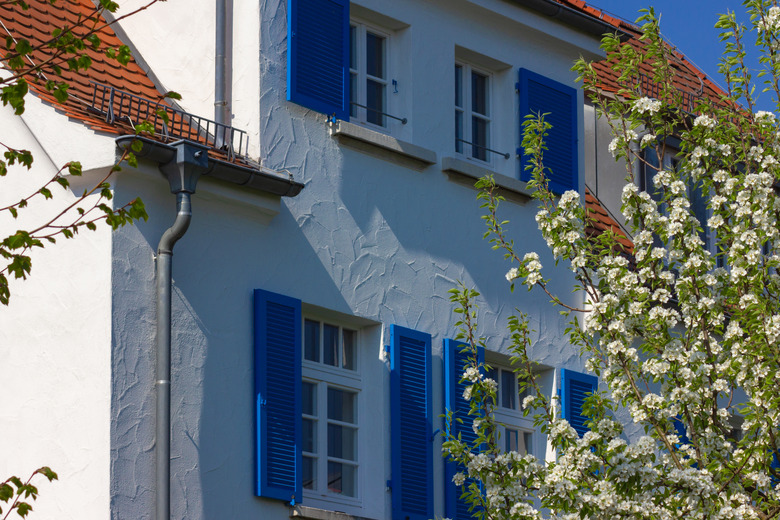 House facade, white and blue.