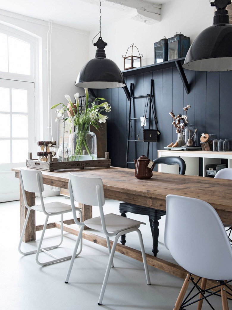 rustic dining room with industrial style pendant lights