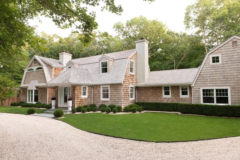 cedar shingled home with white trim