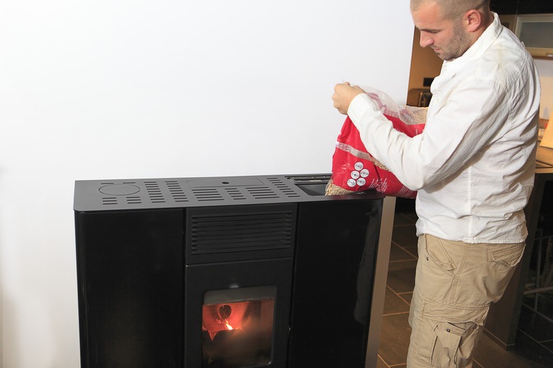 France, man filling a stove