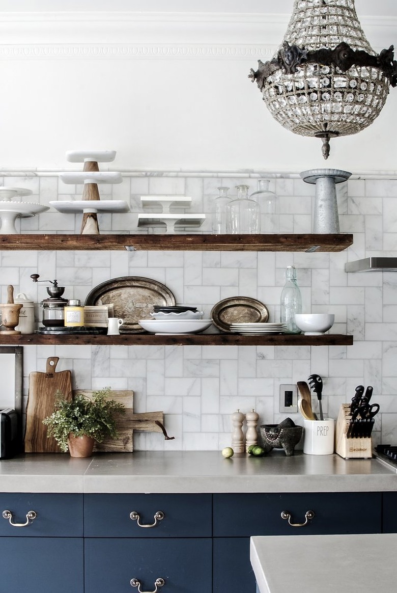 marble subway tile kitchen backsplash with open shelving