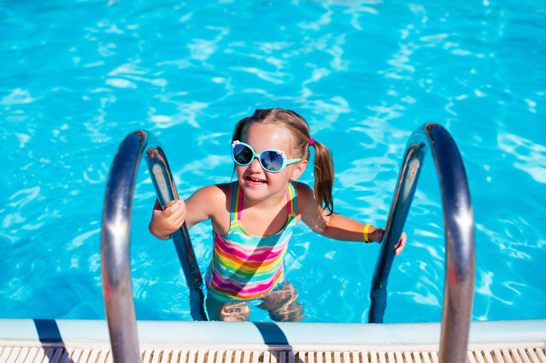 Little girl in swimming pool