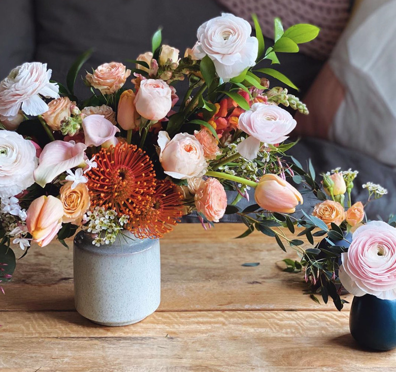 trio of vases featuring pastel fall flower arrangements