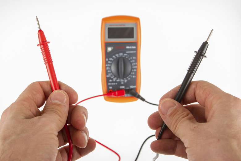 Digital multimeter isolated on a white background