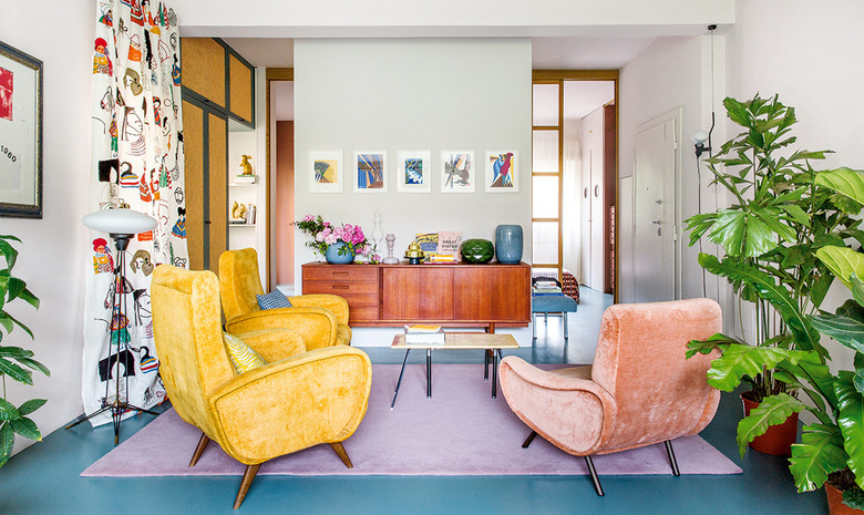 colorful maximalist living room with blue floors