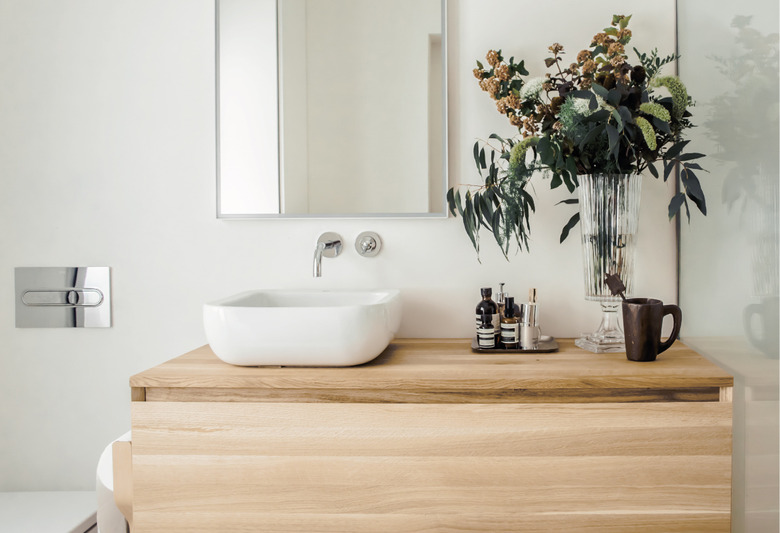 wood countertop and vanity cabinet with vessel sink