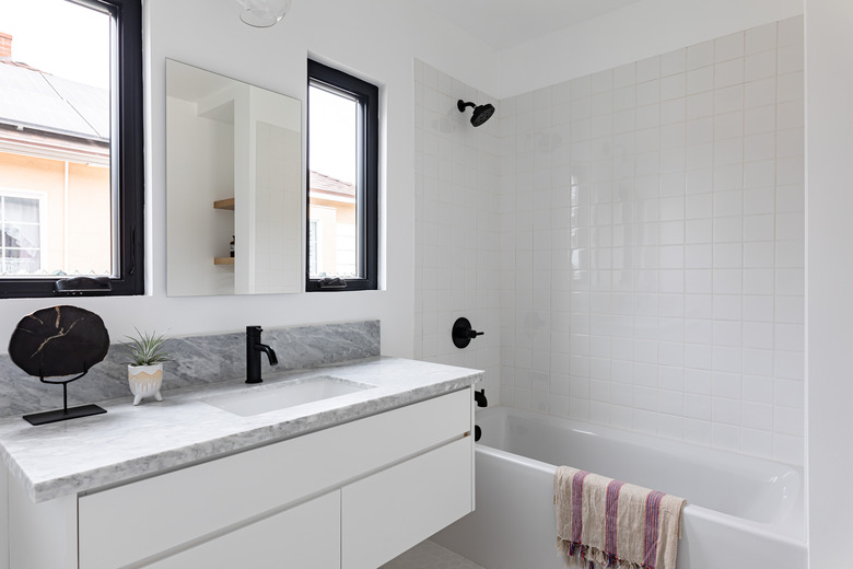 small modern bathroom with floating sink