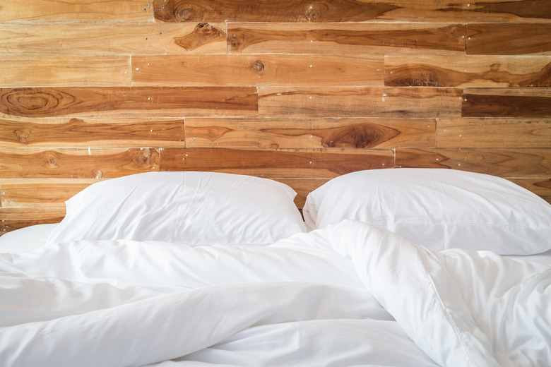 White bedding sheets and pillow, Messy bed concept