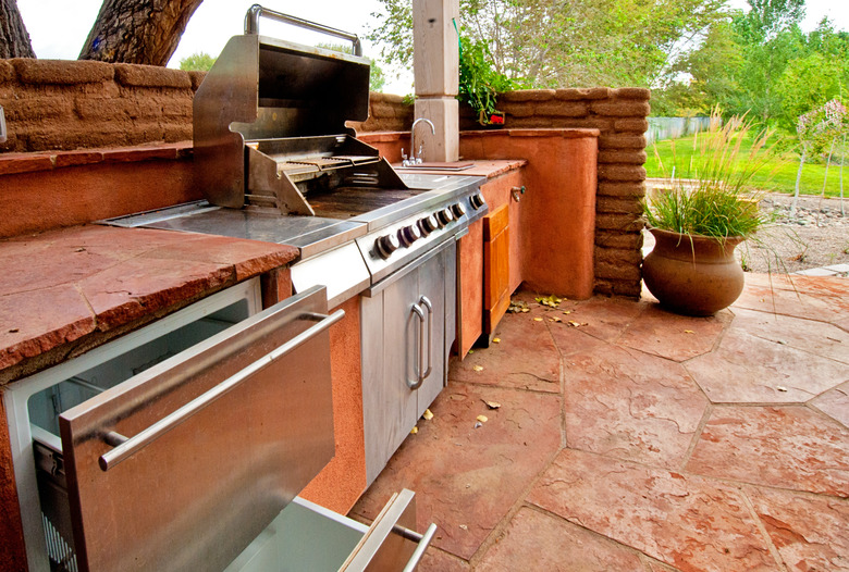 Outdoors Kitchen with Built-In gas grill on a deck