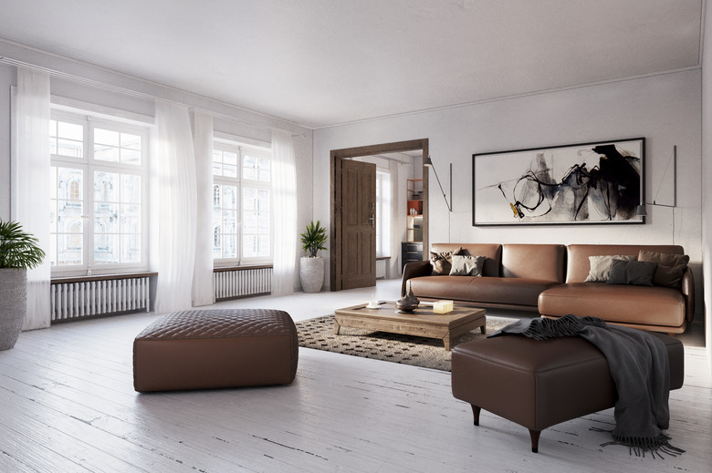 Rustic living room with painted floor.