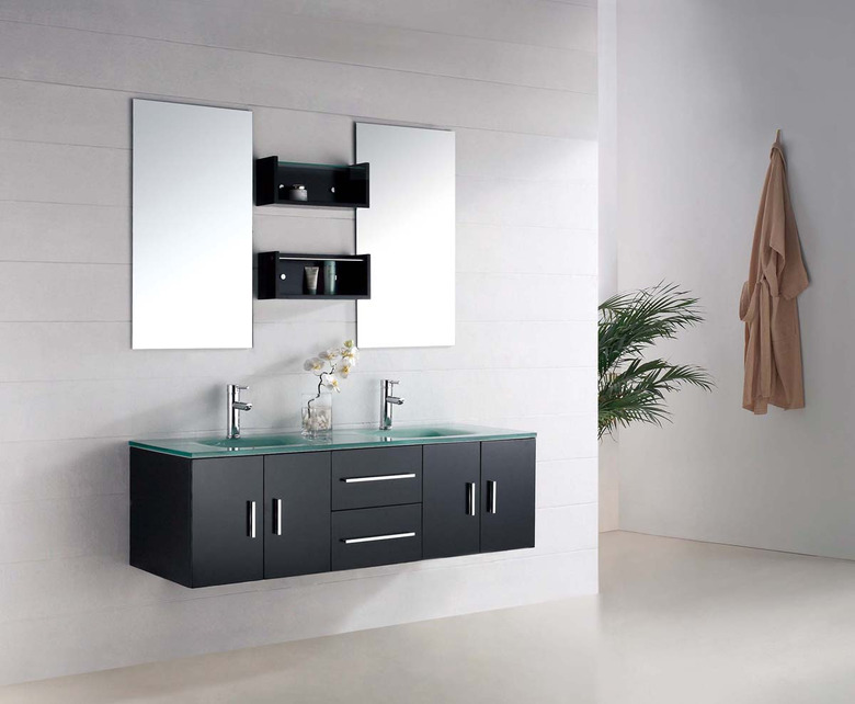 glass bathroom countertop on wall-mounted black vanity cabinet