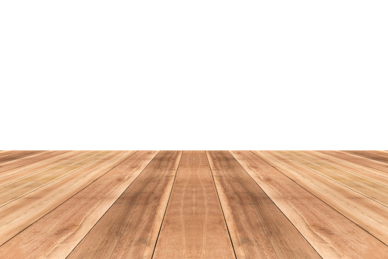 Wooden table top against white background