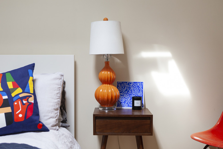 Orange and blue color in bedroom