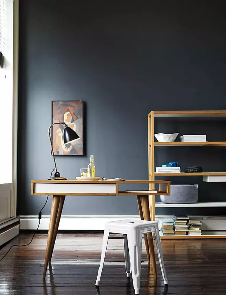 Feng Shui Home Office with midcentury desk and dark wall