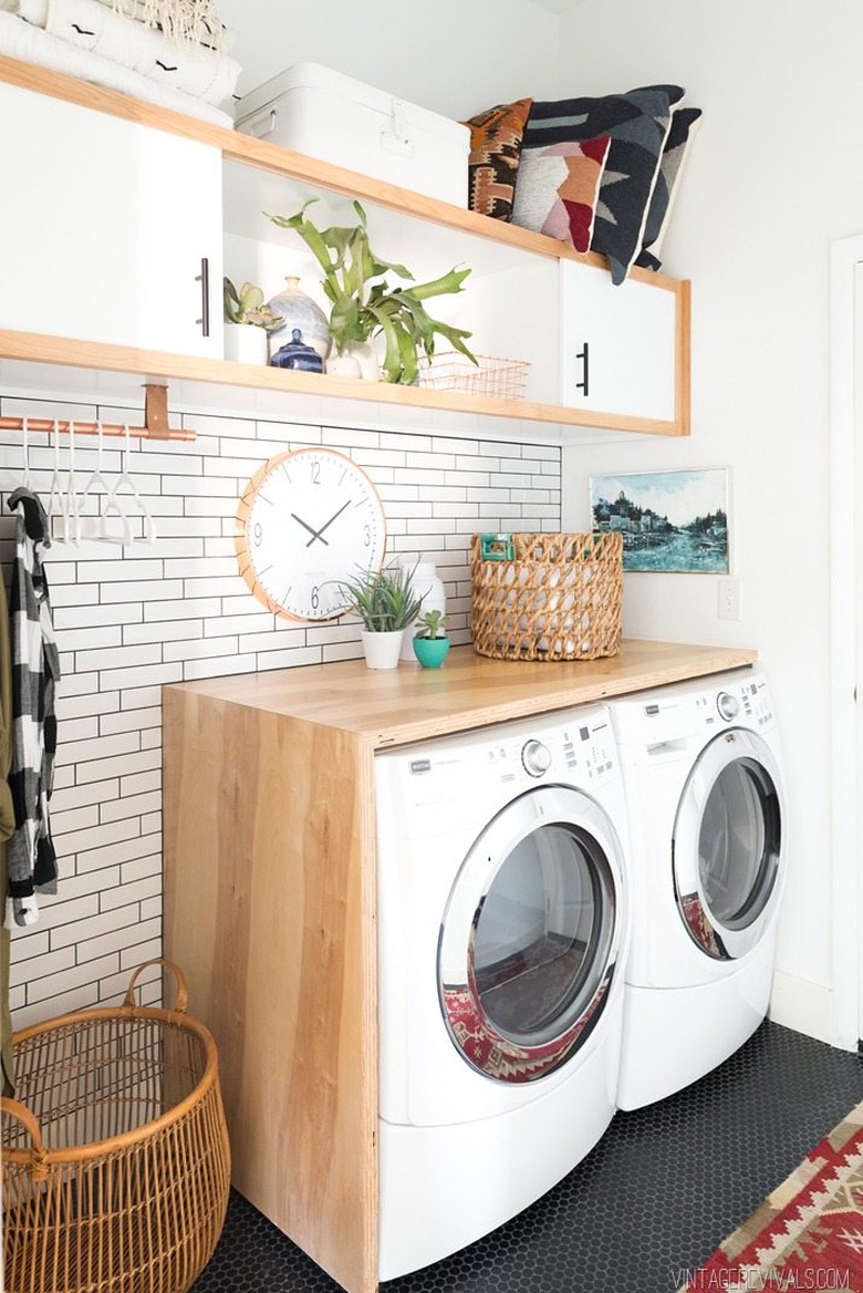 Budget-Friendly Small Laundry Room Ideas in boho laundry room with DIY stacked plywood countertop