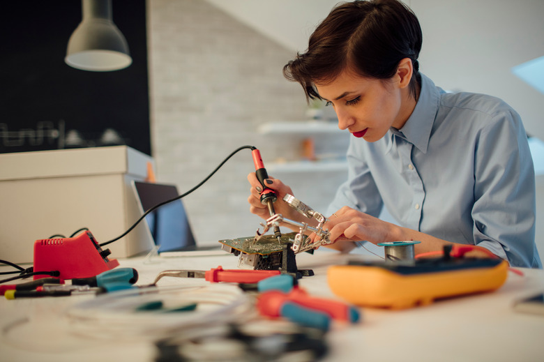 Woman in her tech office.