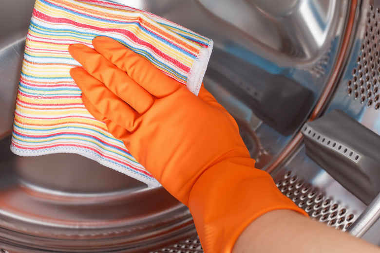 Cleaning washer drum.