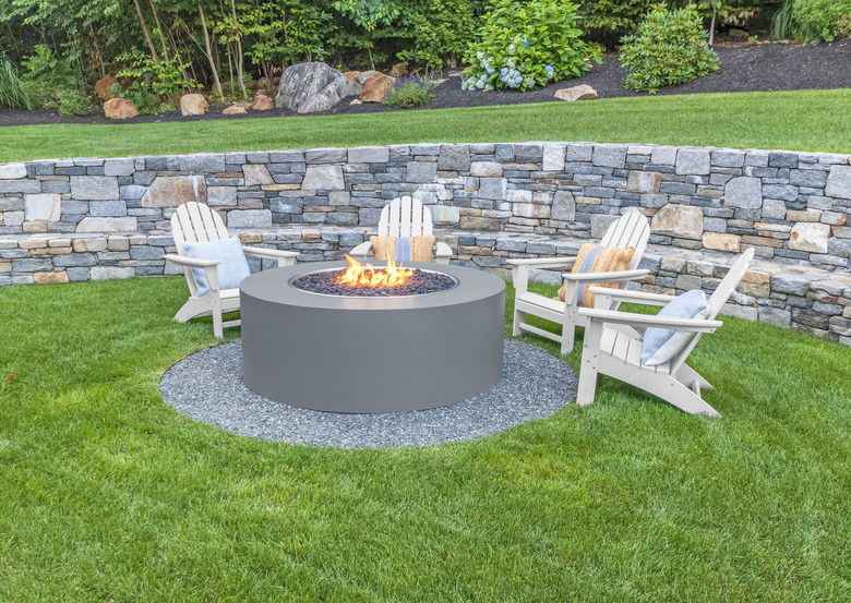 Adirondack chairs around fire pit