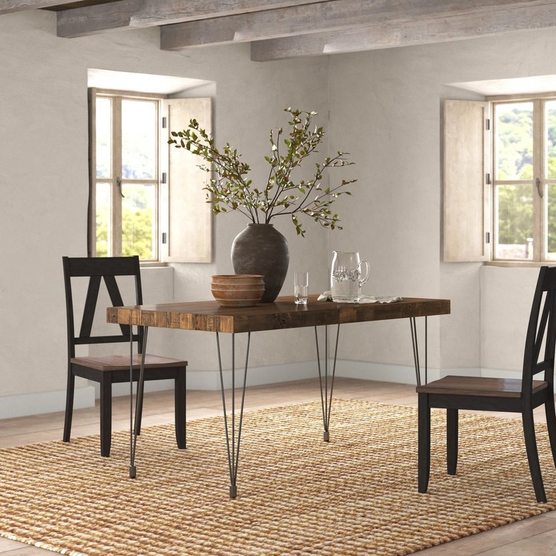 wood dining table in simple dining room