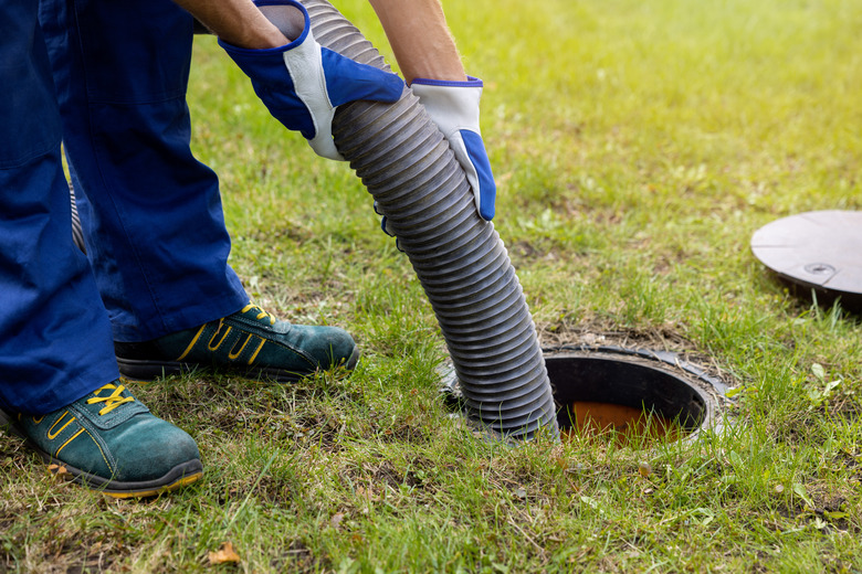 Pumping household septic tank.