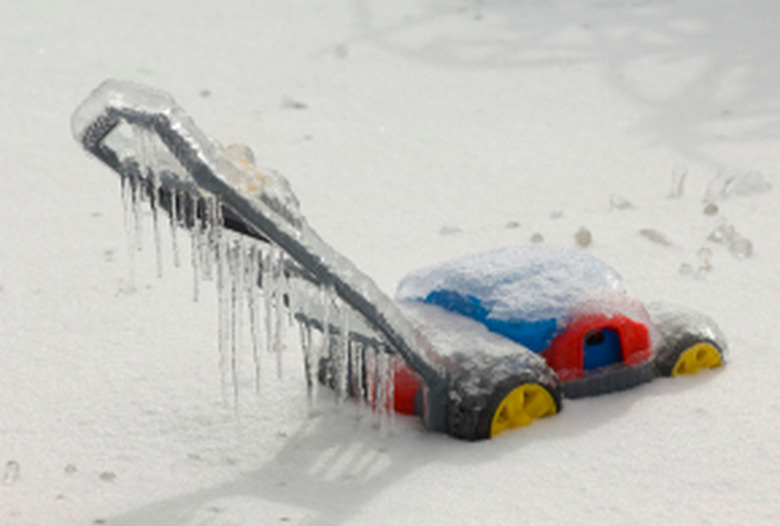 Lawnmower in the snow.