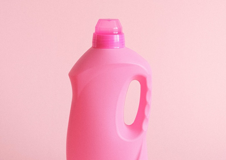 pink laundry detergent bottle with pink clear plastic cap