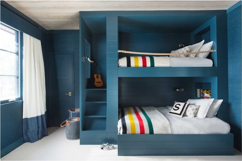 nautical theme blue bedroom with bunk beds