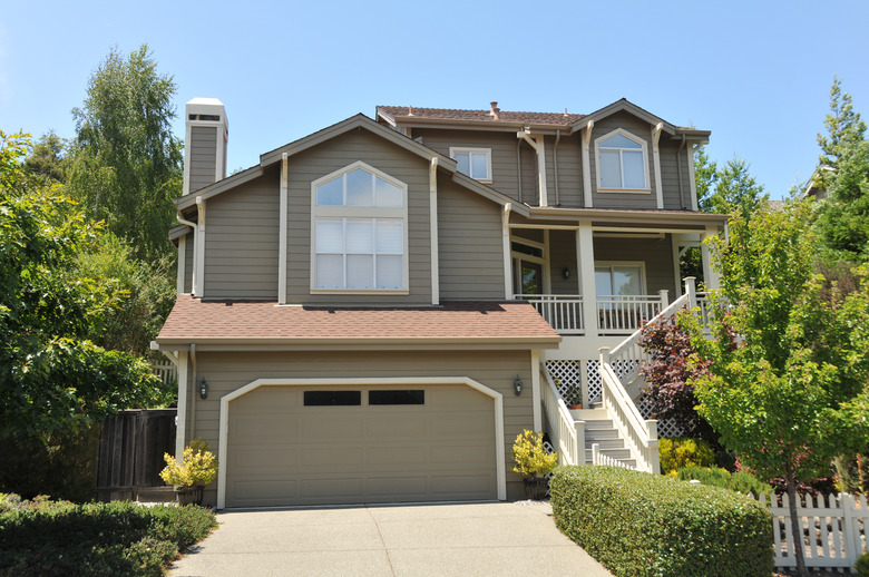 Two story single family house with driveway