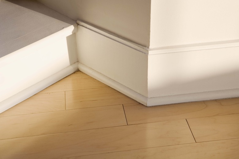 Baseboard and wooden floor