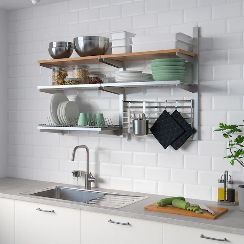 kitchen space with shelves on the wall