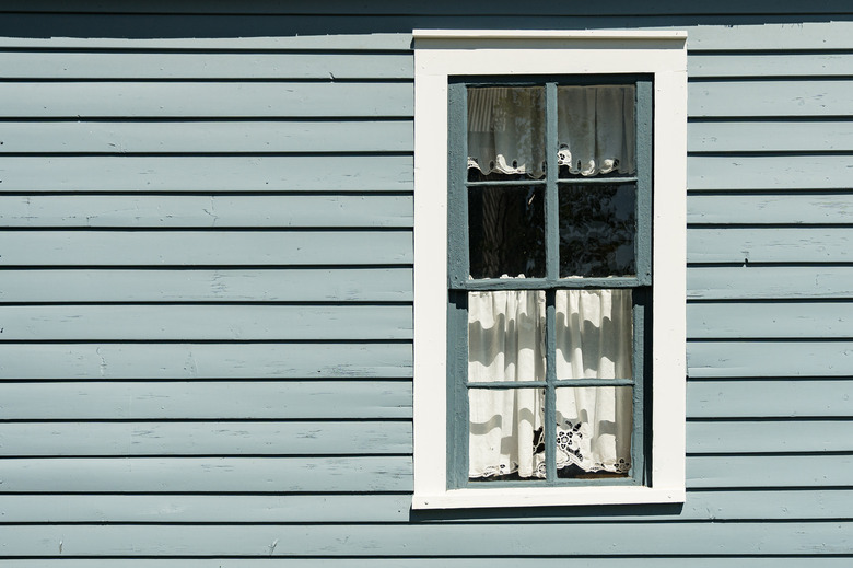 Old painted gray and white window