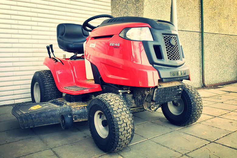 Riding mower in storage.