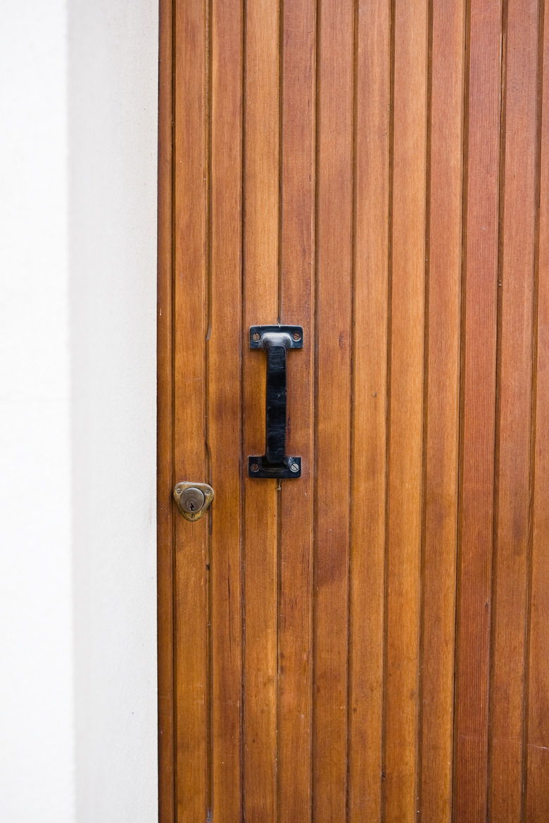 Wood paneling door