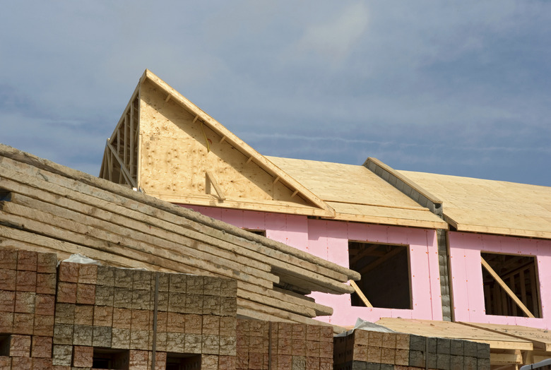 New house under construction using pink foam board.