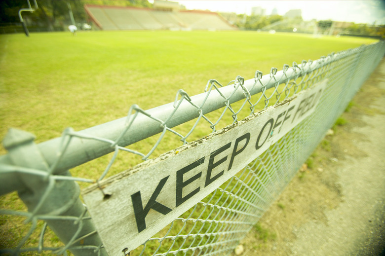 Sign on fence