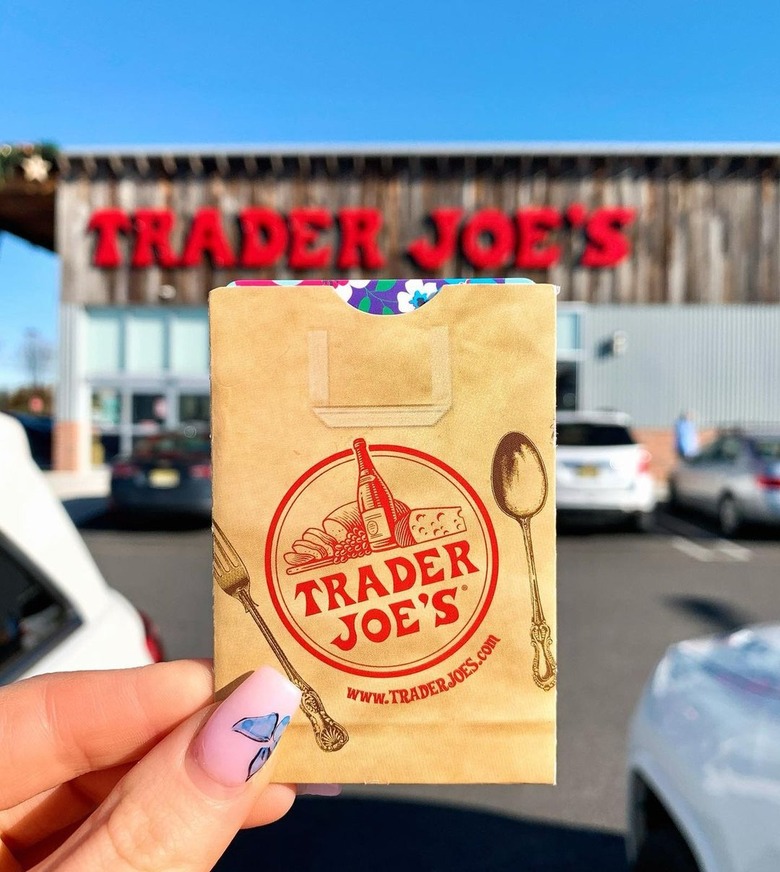 A person holding up a Trader Joe