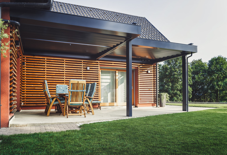 Modern patio roof addition covering patio area