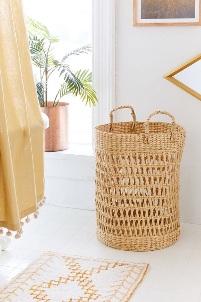 small bathroom storage ideas with seagrass woven laundry basket