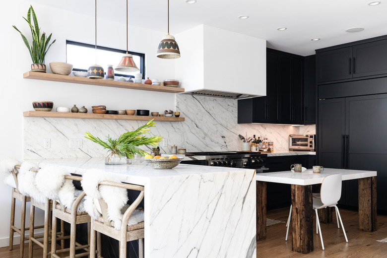 kitchen with natural stone backsplash and matching island